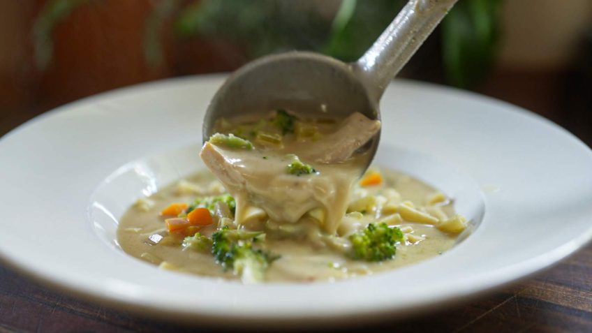 A Cheesy Broccoli Chicken Soup Recipe You Can’t Resist